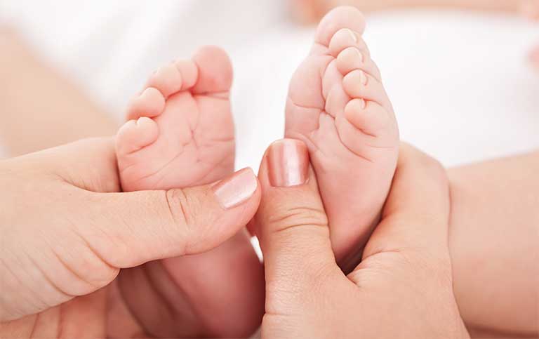 Massage giữ ấm cho bé